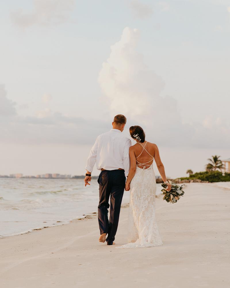 couple walking along beach
